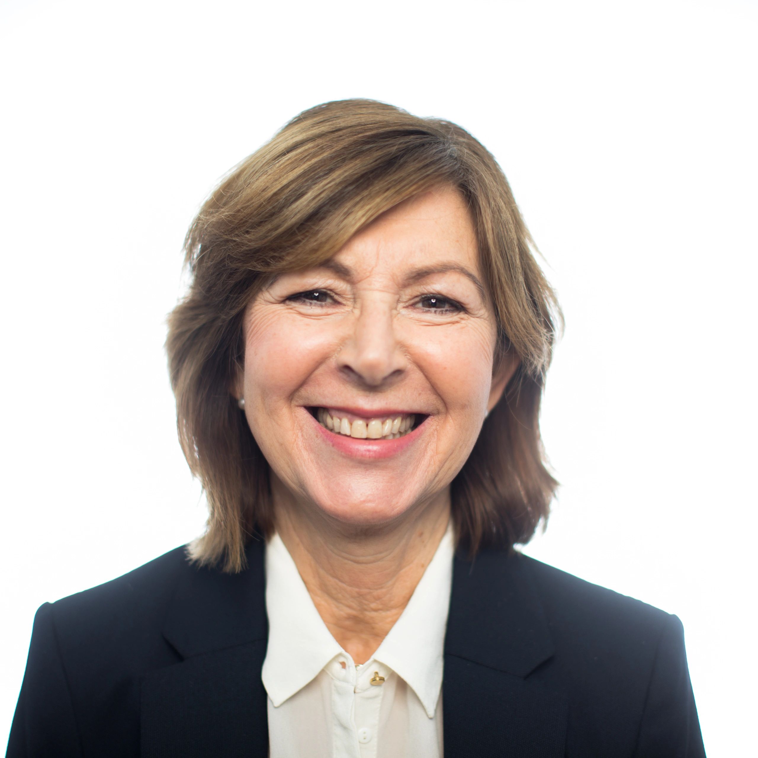 Professional headshot of a senior businesswoman